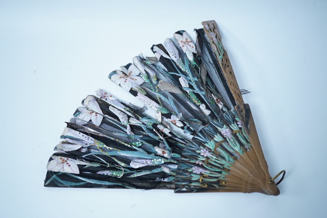 A collection of 19th century and later fans to include a black lacquered and lace example and a hand painted floral example